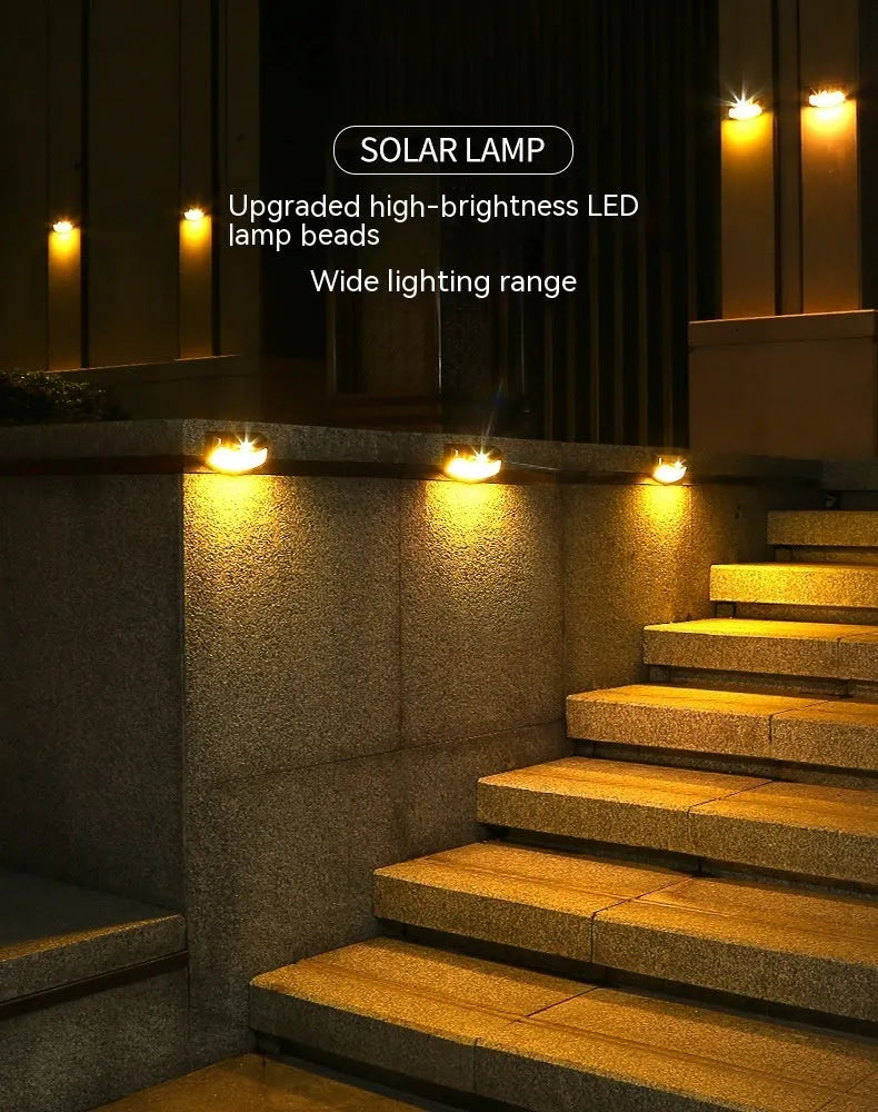 Solar outdoor wall lamp with smiling face design measuring 153mm wide