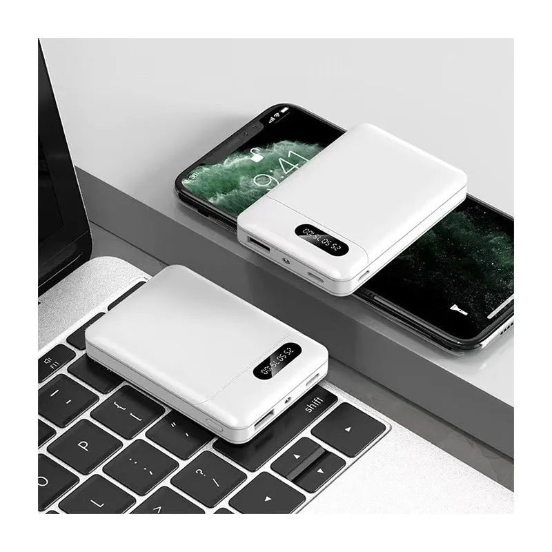 Black and white portable power bank with multiple USB ports showing front and side views.