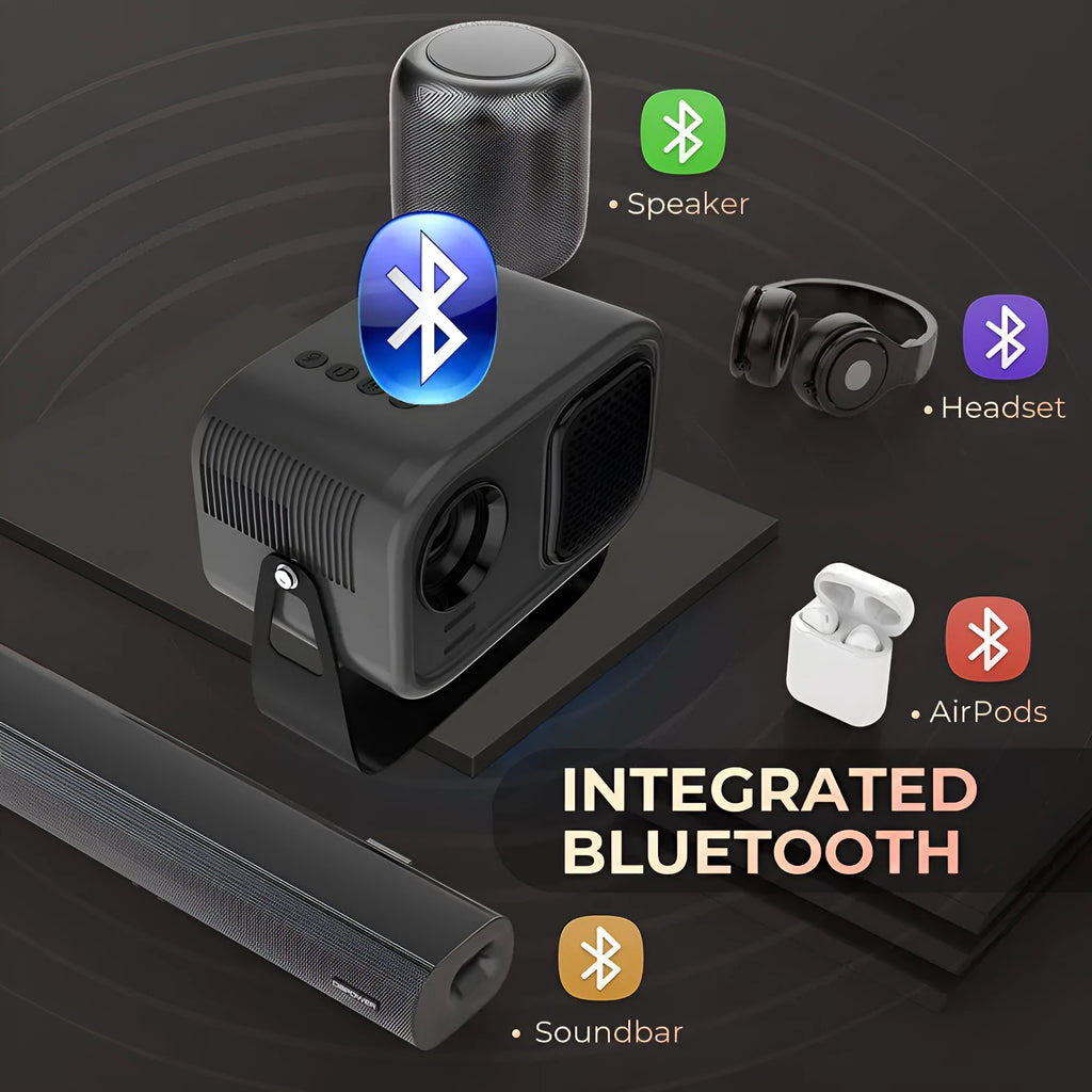 Black compact HD smart portable projector with remote control on a table.