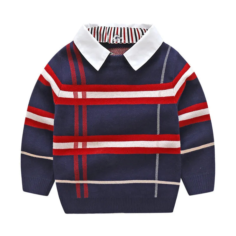 Boys apricot and navy blue plaid jacquard knit sweater with long sleeves on hanger.