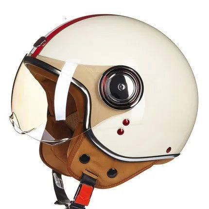 White, red, and green ABS plastic half helmet for motorcycle and electric bicycle riders on a grey background.