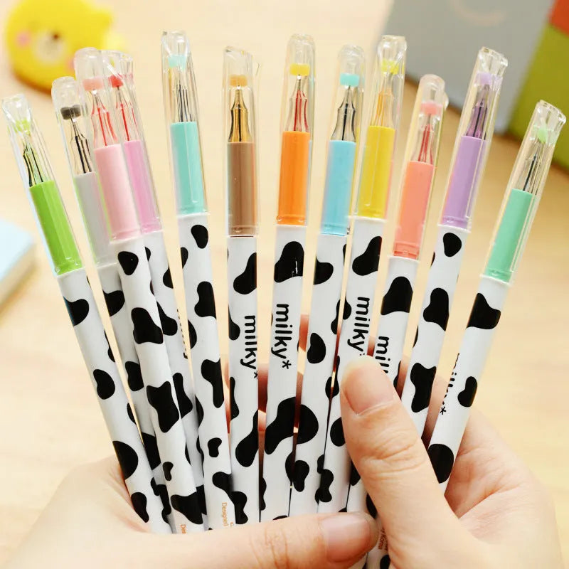 Box of 12 cow colour gel pens with 0.38mm tips showing assorted plastic barrels.