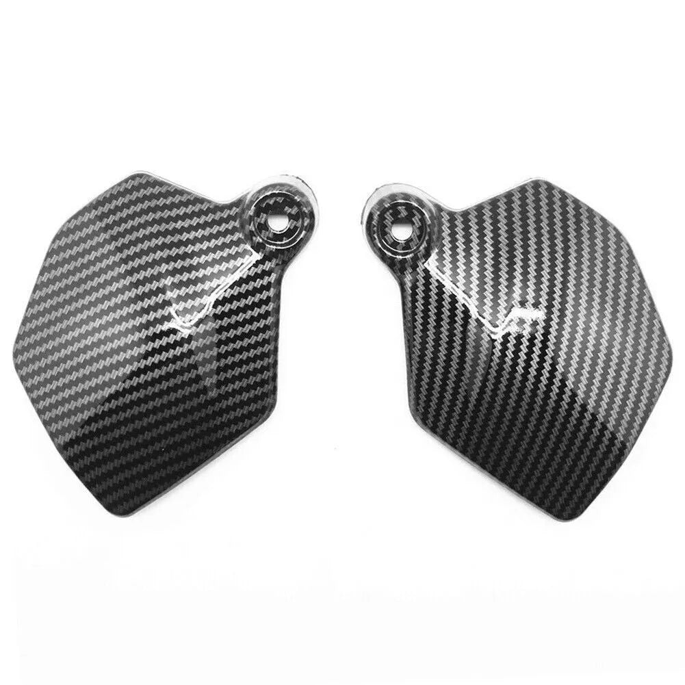 Pair of black carbon fibre style ABS plastic side upper frame covers for Honda CBR1000RR motorcycle.