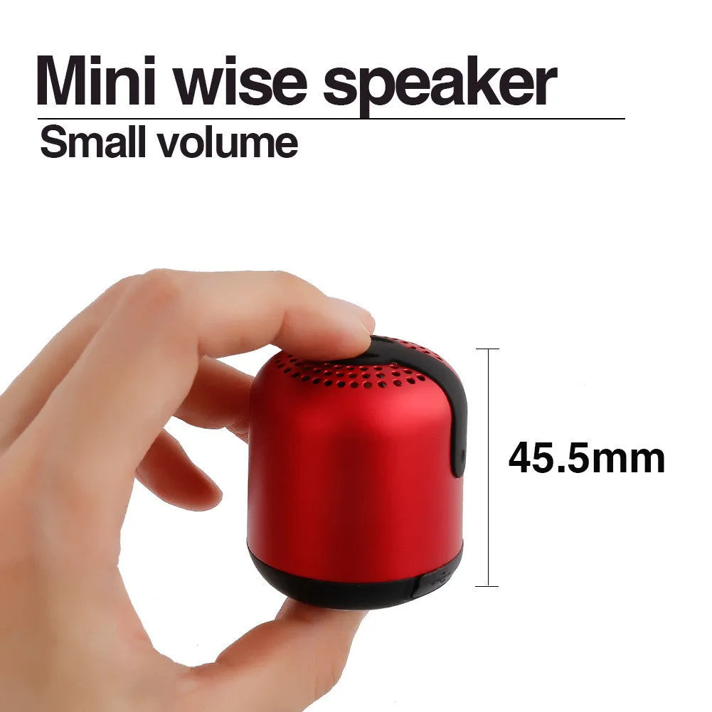 Hieha XQ11 mini cylindrical portable Bluetooth speaker in silver colour on a table