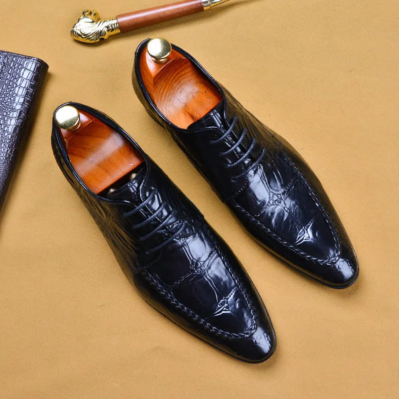 Men's black leather shoes with alligator pattern texture and horse bit buckle detail