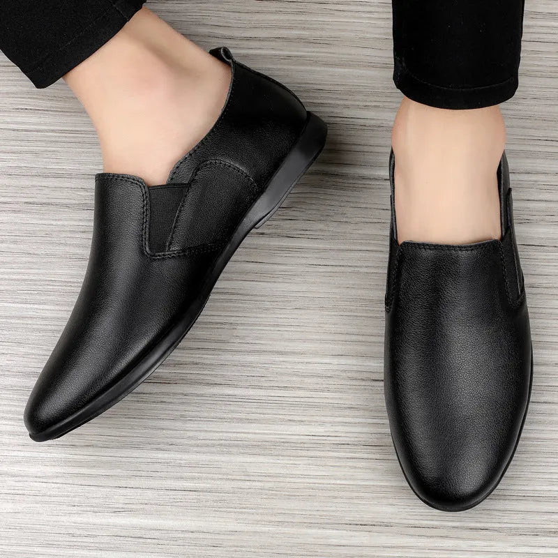 Men's black and brown leather shoes with round toe design for business casual wear.