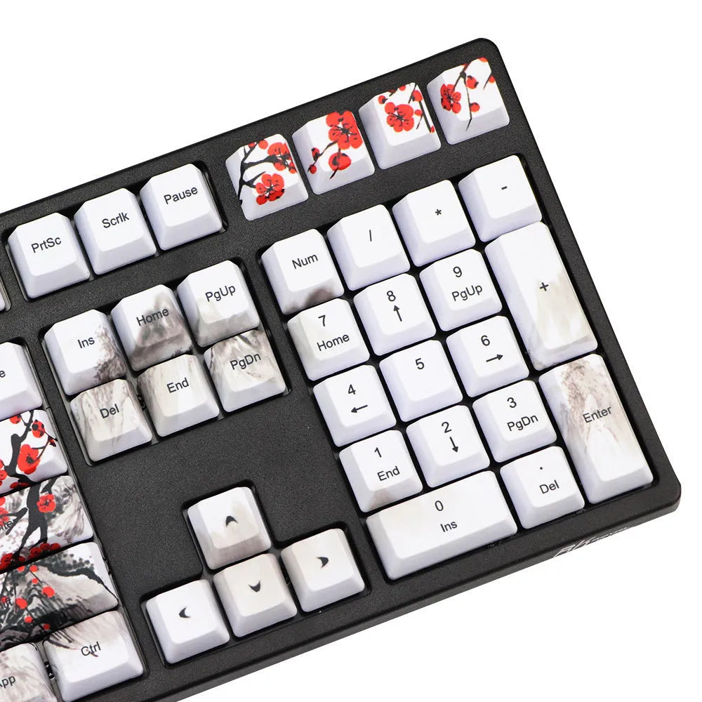 PBT Wangjiang plum blossom theme keycap set with Korean legends on a keyboard.