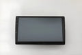 10.1 inch trapezoid Android car stereo head unit with touch screen display on a dashboard