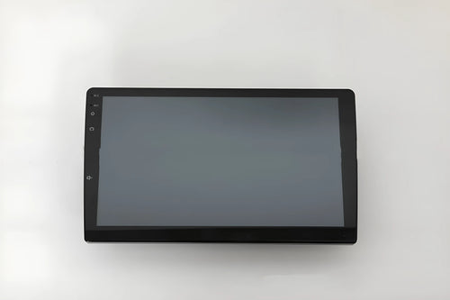 10.1 inch trapezoid Android car stereo head unit with touch screen display on a dashboard