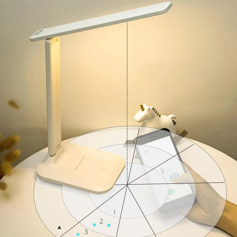 White plastic bedside table lamp with touch dimming and USB charging port.