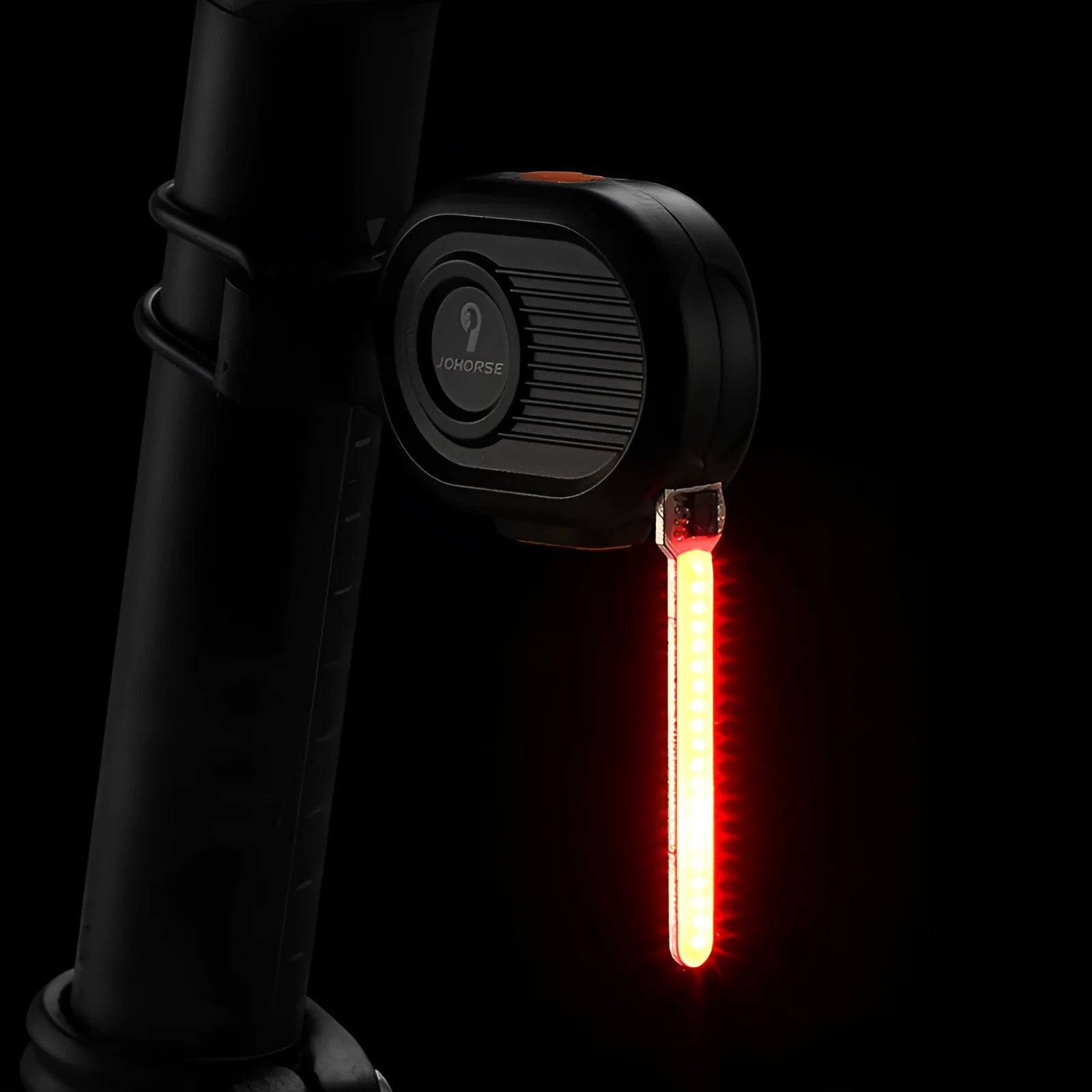 Bicycle taillight displaying a blue waterfall or running water light effect on a dark background.