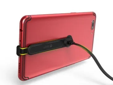 Gaming phone charging cable with 90-degree L-shaped connector and white suction cup attached to mobile phone.