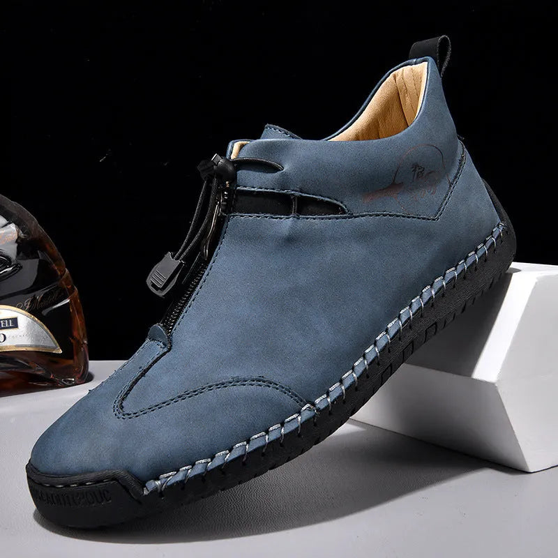 Men's black casual leather shoes with a round toe, tall crown, and a rubber sole.