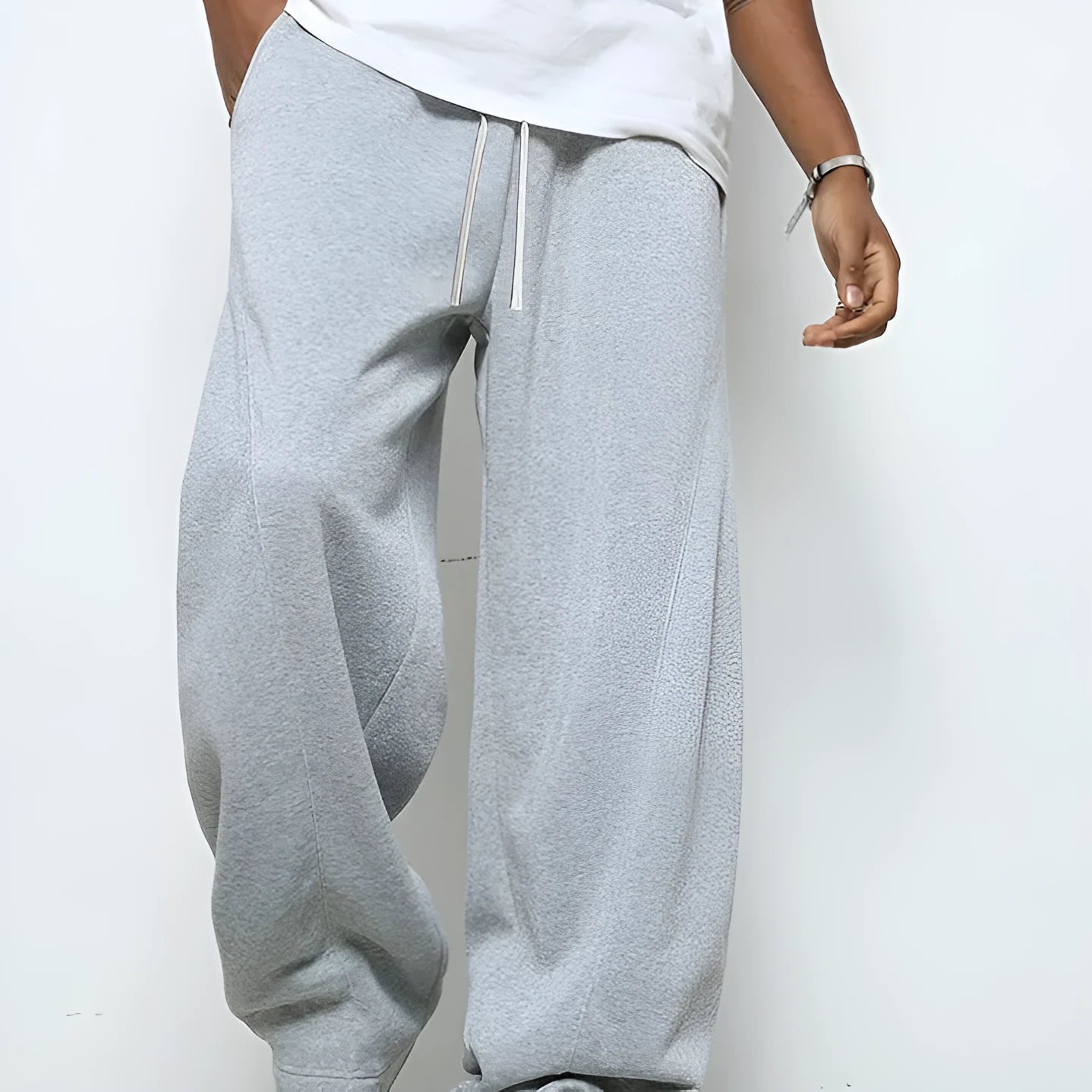 Men's straight-leg polyester casual trousers in black with a drawstring elastic waistband.