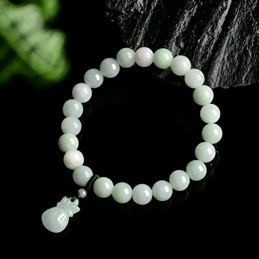 Jade flower bracelet with 8mm diameter floral centrepiece and adjustable unisex fastening