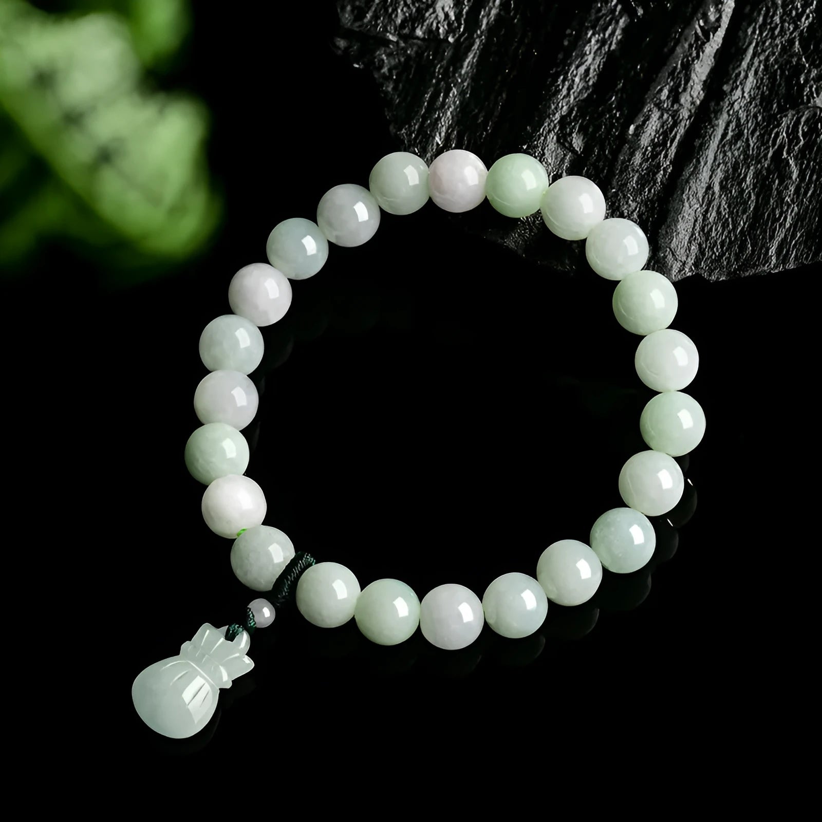 Jade flower bracelet with 8mm diameter floral centrepiece and adjustable unisex fastening