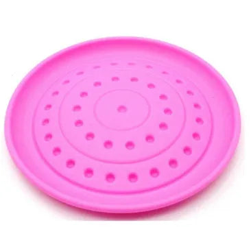 Rubber dog flying disc toy in multiple colours showing small and large size variants for canine fetch games