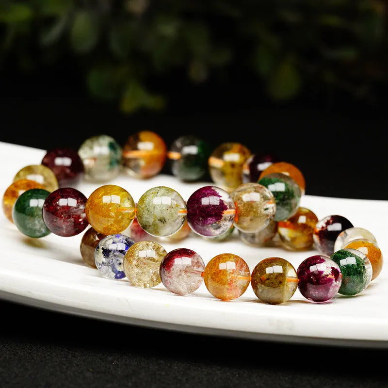 Colourful crystal bracelet with 10mm ball beads showing ghost cornucopia design in ethnic style