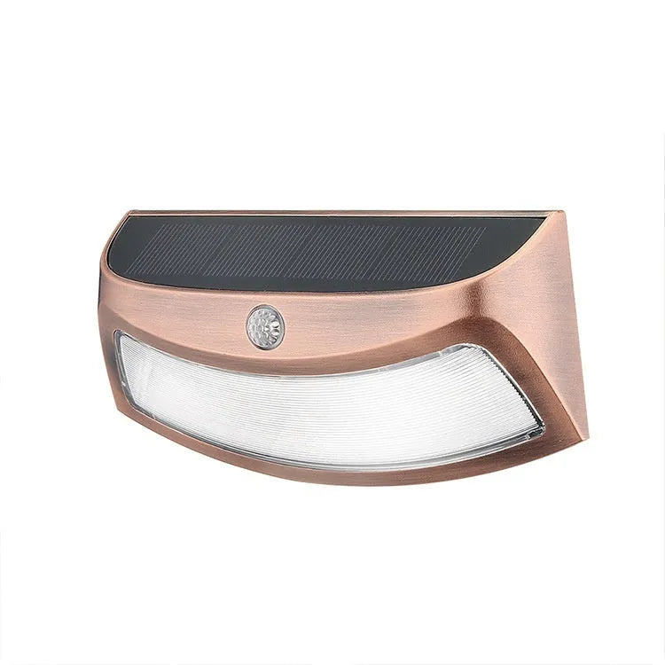 Solar outdoor wall lamp with smiling face design measuring 153mm wide