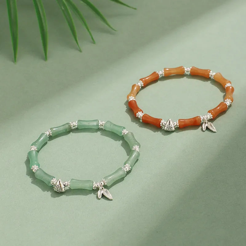 Electroplated bamboo strawberry crystal bracelet for women in green aventurine, showing natural stones on a bracelet.