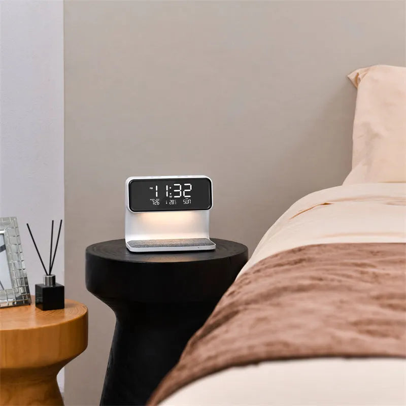 White 3-in-1 bedside lamp with wireless charging pad, LCD clock screen, and fabric-effect ABS shade.