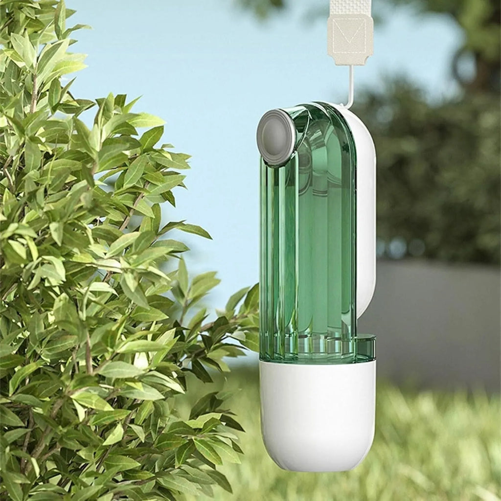 Foldable dog water bottle with food dispenser in beige or green colour for walking and hiking