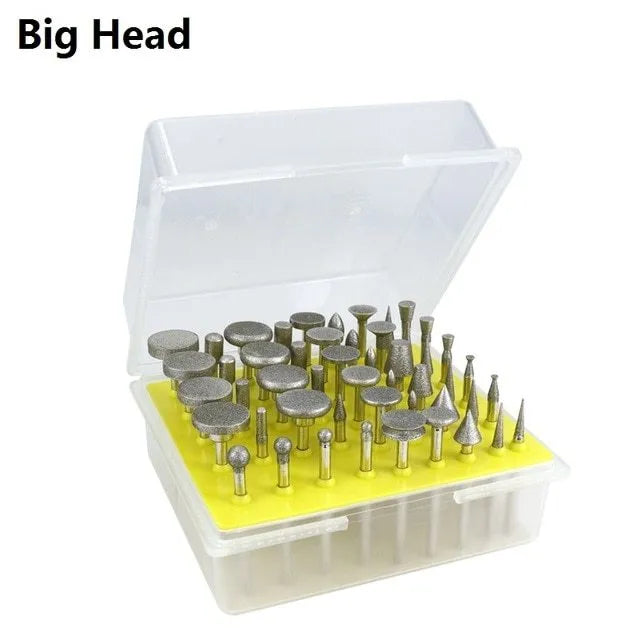 Alloy grinding head with elliptical cone shape and emery abrasive, showing 3mm shank diameter.