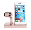 White Apple Watch and iPhone 2-in-1 charging dock station on a wooden desk.