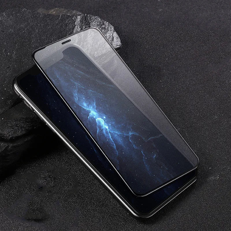 Tempered glass screen protector for Apple iPhone models on a clean surface.