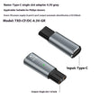 Black USB-C charging adapter for electric shaver with aluminium alloy case.