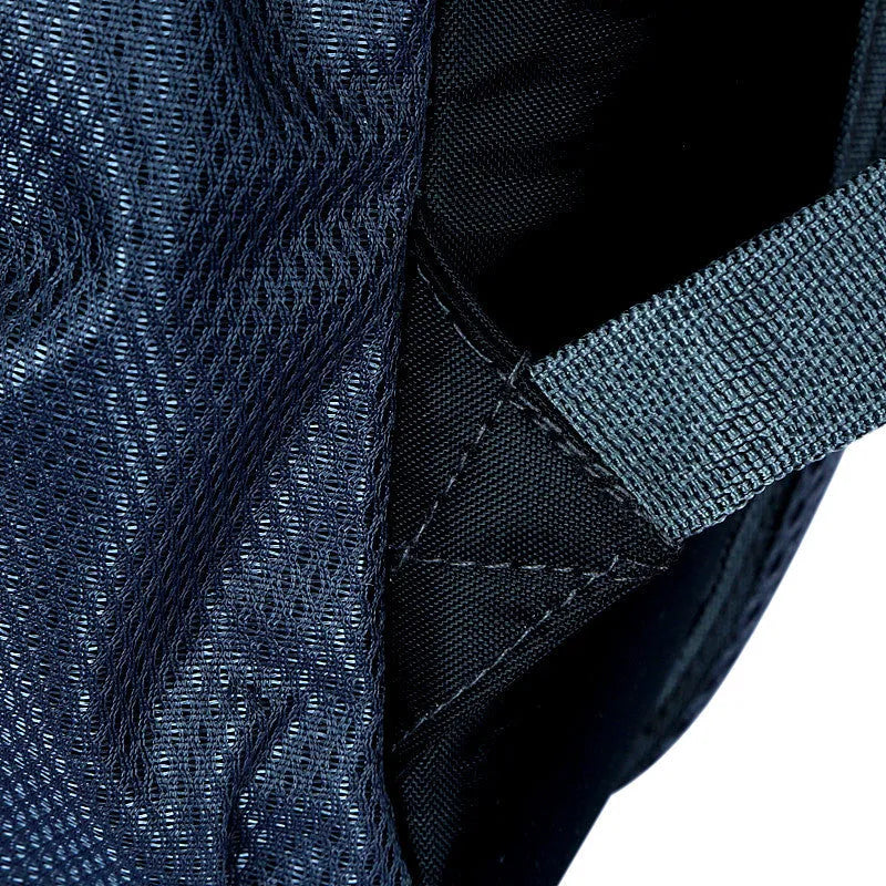 Large black Oxford cloth travel backpack showing dual shoulder straps, front compartments, and substantial 31x51x19cm dimensions
