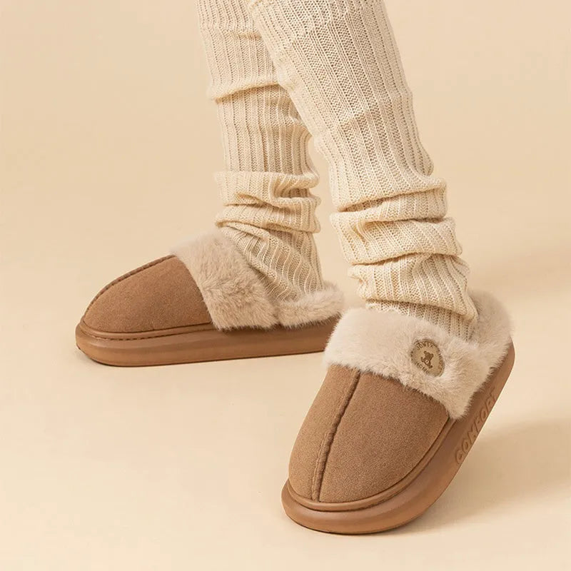 Plush fleece winter slipper for indoor use with thick PVC sole, shown in multiple colours.