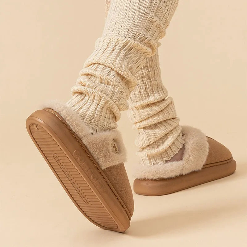 Plush fleece winter slipper for indoor use with thick PVC sole, shown in multiple colours.