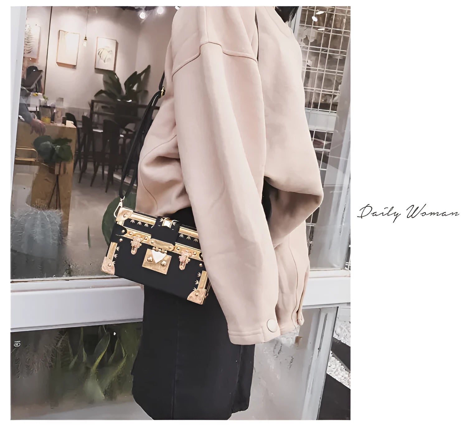 Women's hard black flap handbag with single strap, rivet details, and hasp closure.