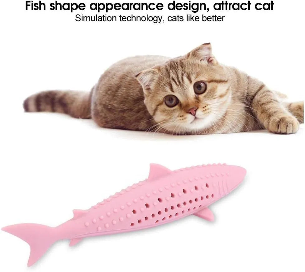Green dolphin-shaped silicone cat chew toy with side holes on a white background
