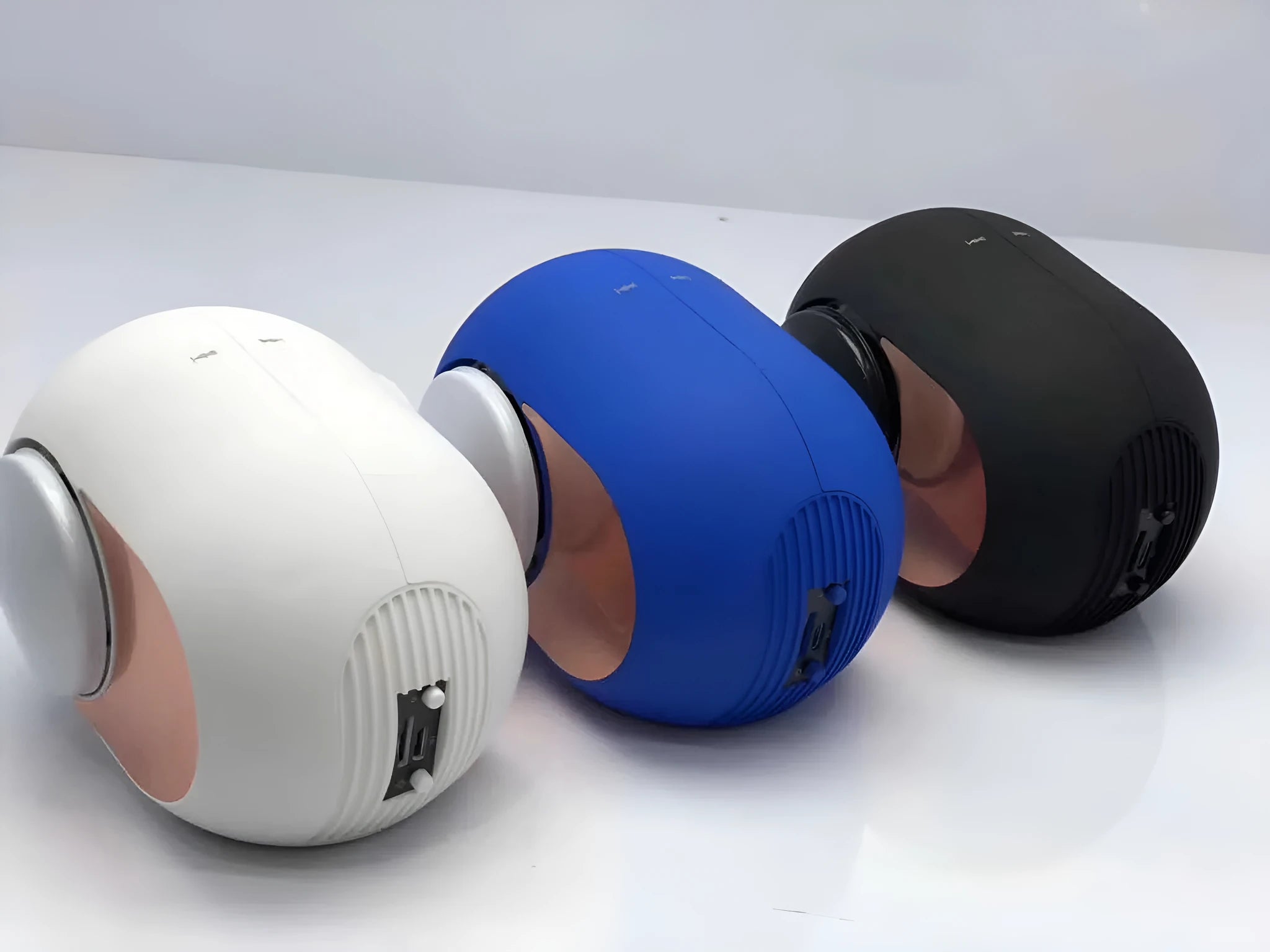 Compact egg-shaped portable Bluetooth speaker in choice of colours with charging cable