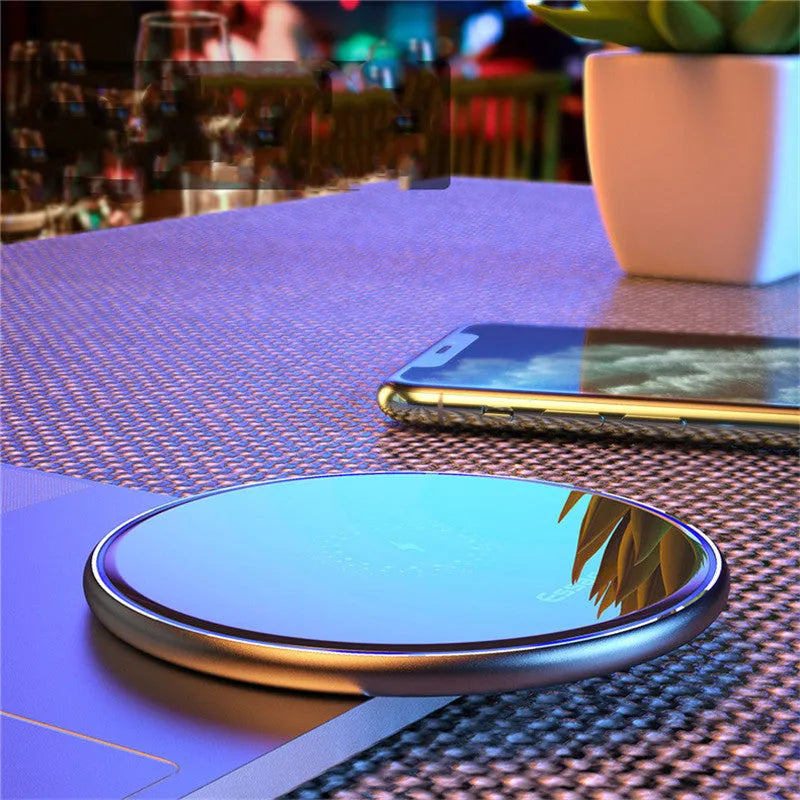 Black or white 15W fast wireless Qi charger with LED light indicator and anti-slip surface