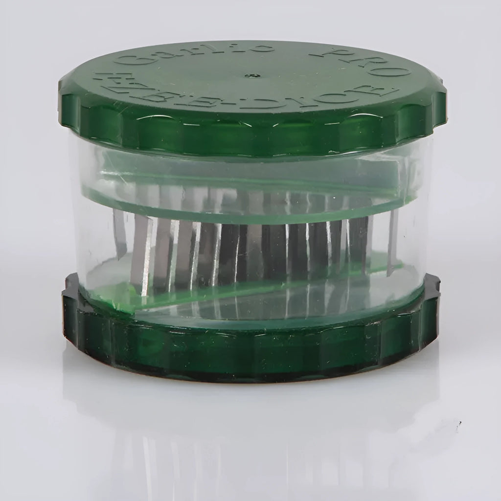 Green transparent PP plastic garlic peeler kitchen gadget on a countertop