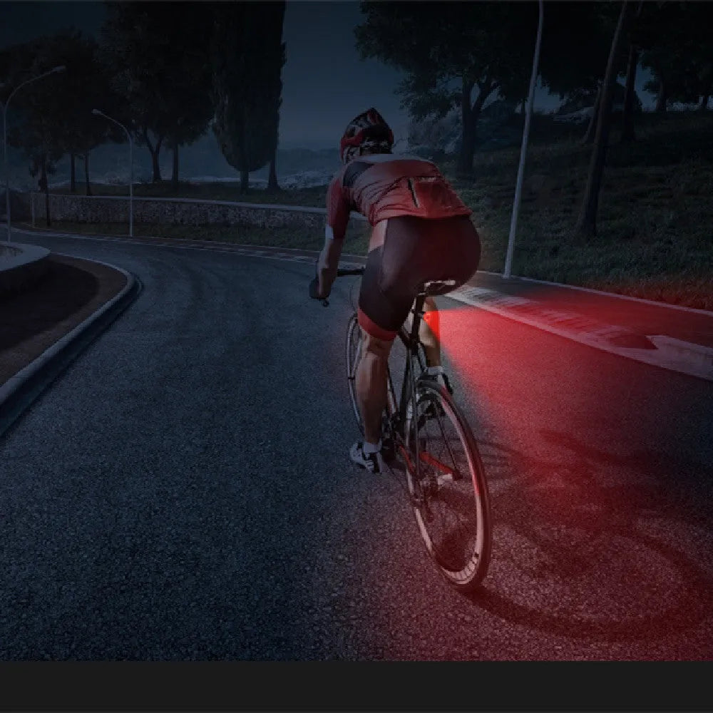 Black USB rechargeable aluminium smart brake sensing bicycle taillight showing front and side views.