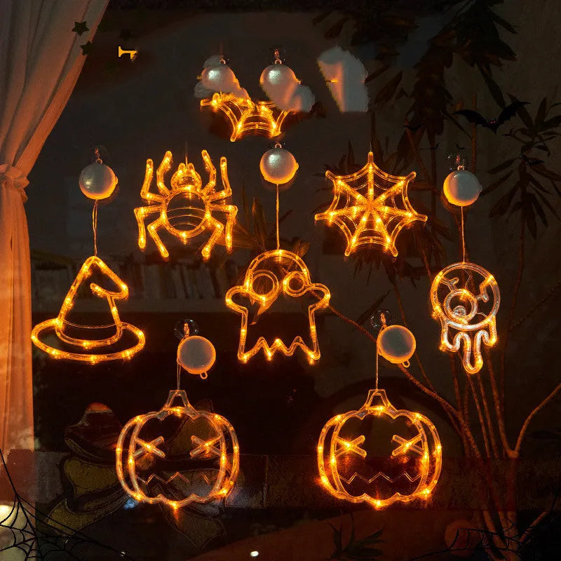 Halloween window hanging LED lights with ghost, spider, and pumpkin designs