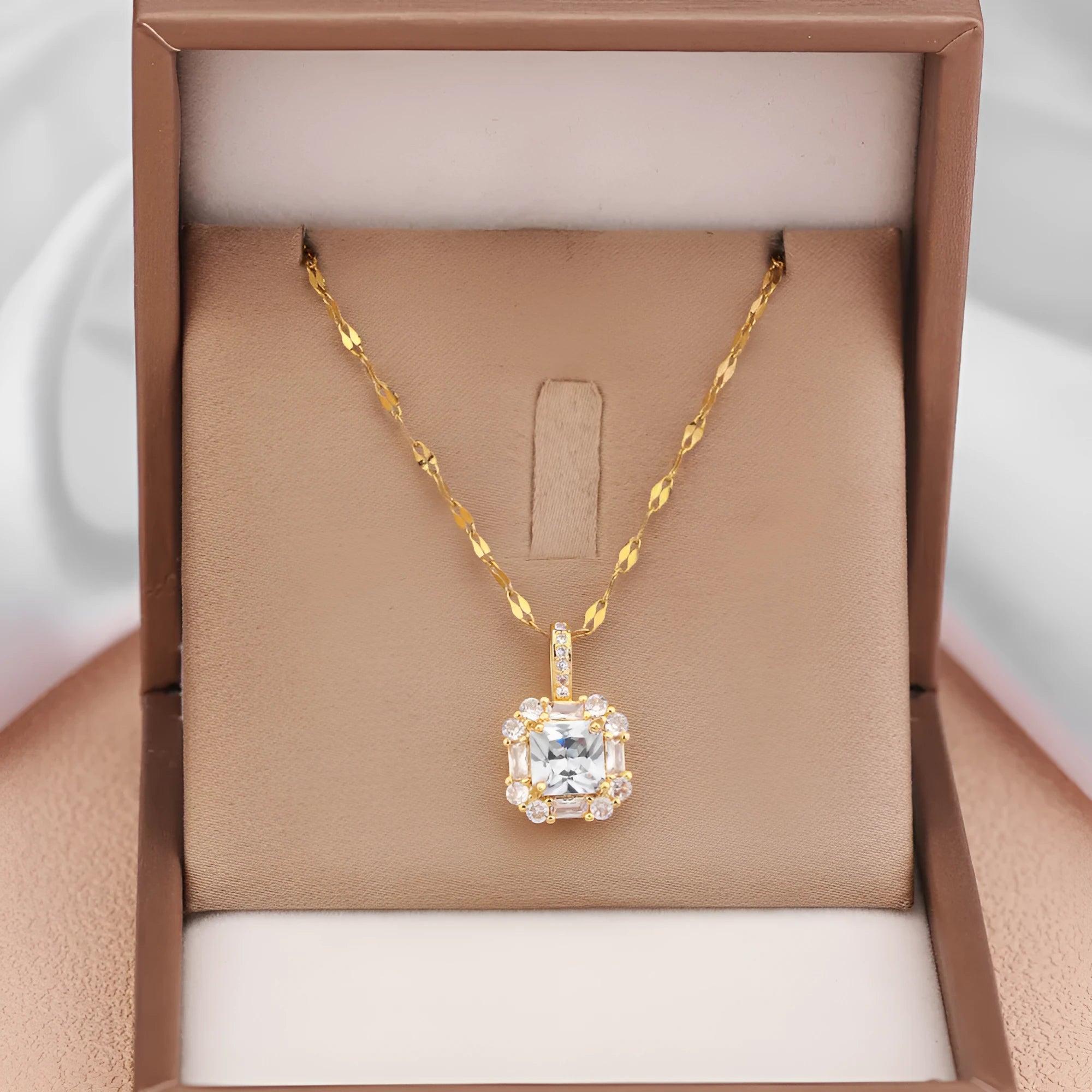 Women's titanium steel geometric zircon clavicle chain necklace with water wave chain in gold.
