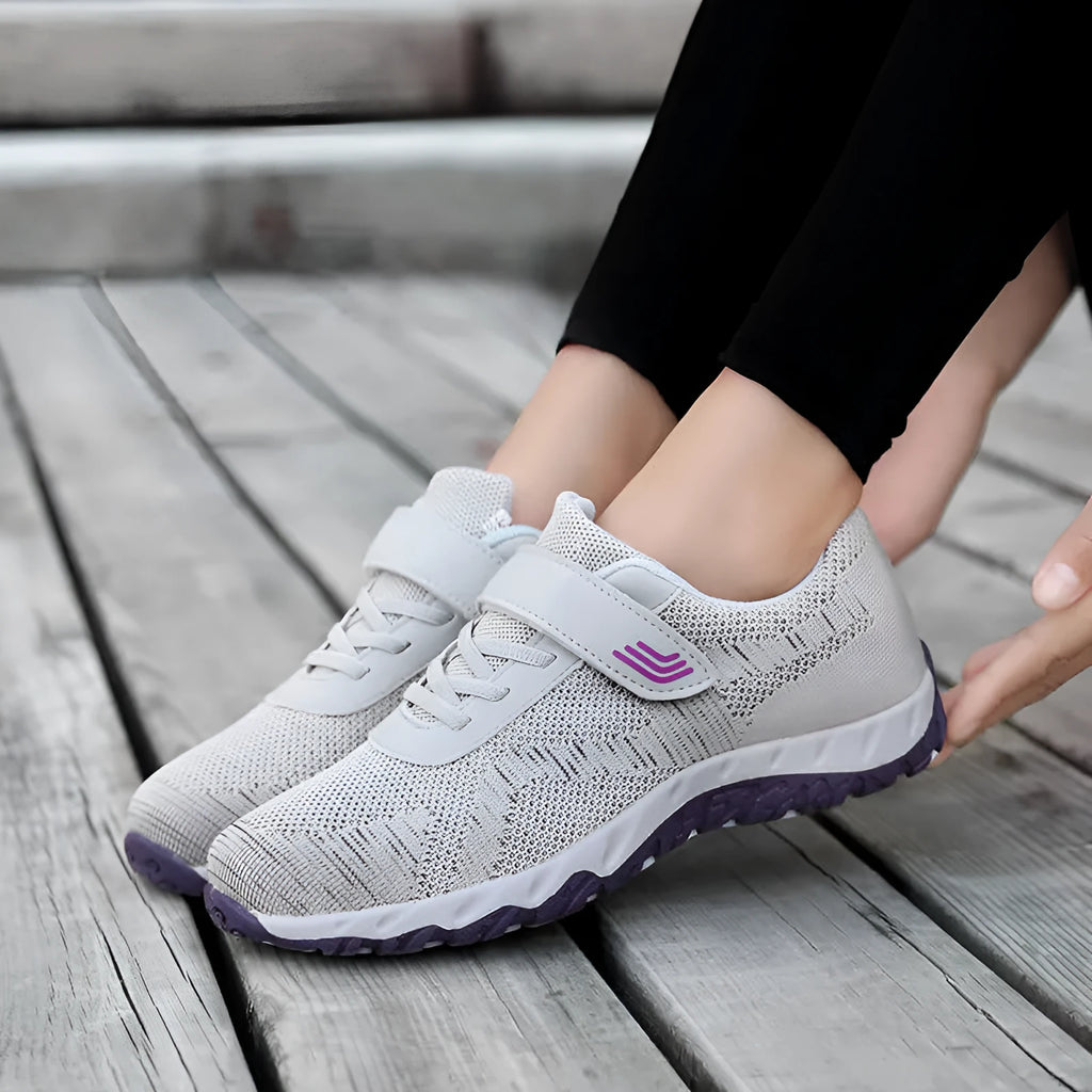Women's low-top grey purple wedge shoes with Velcro strap and breathable mesh upper.