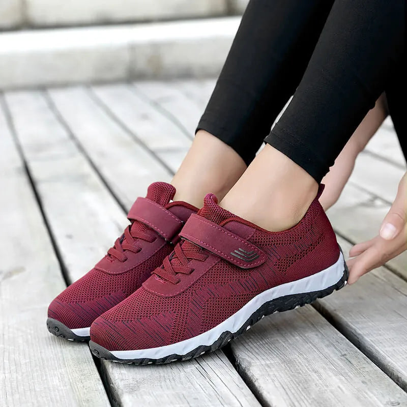 Women's low-top grey purple wedge shoes with Velcro strap and breathable mesh upper.
