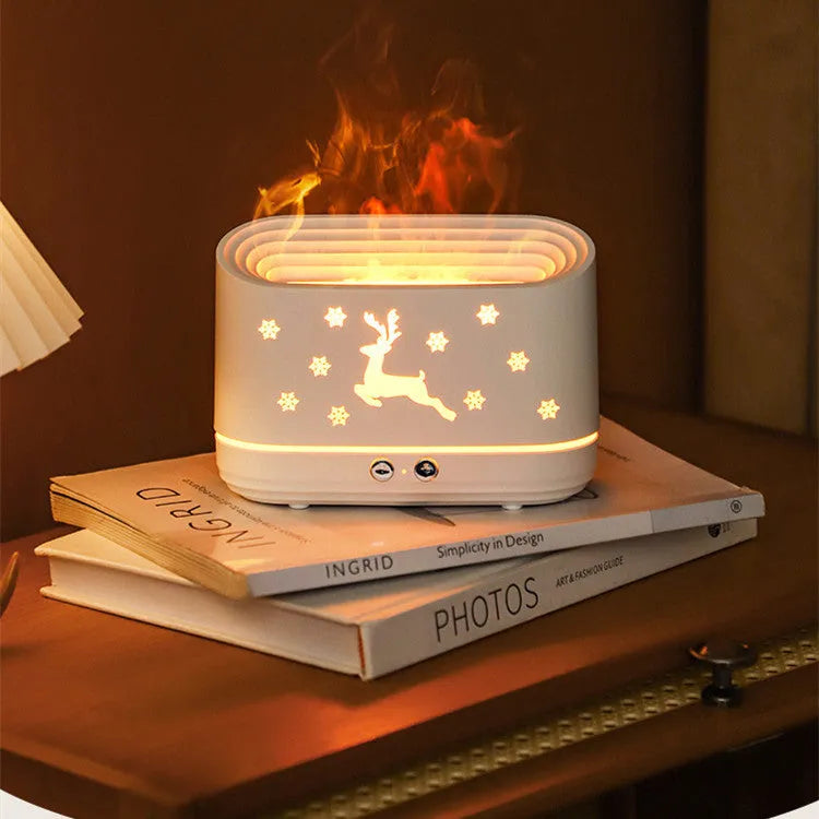 White flame effect humidifier diffuser with LED lighting and Christmas pattern, showing mist output