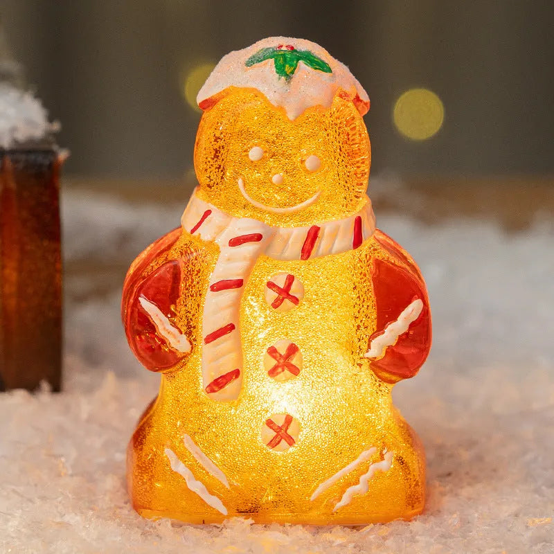 Glowing plastic gingerbread man snowman Christmas ornament with scarf in one of four colour options.