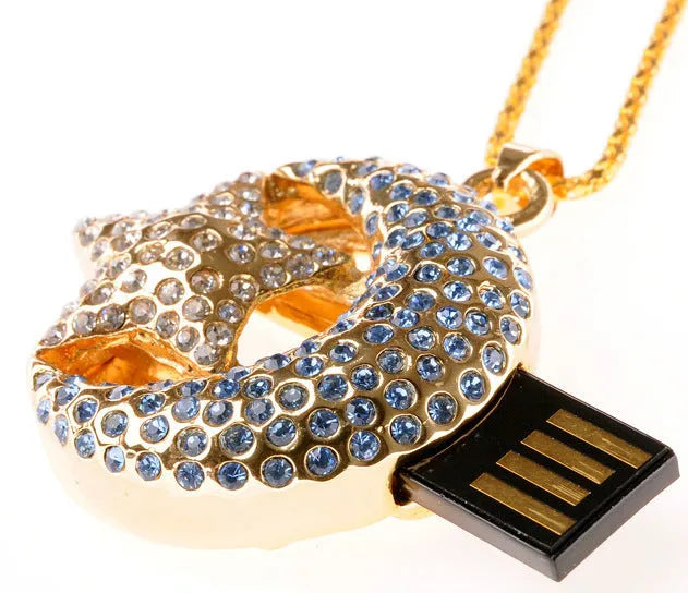 Jewelry Xingyue metal USB 2.0 flash drive in a creative design on a white background.