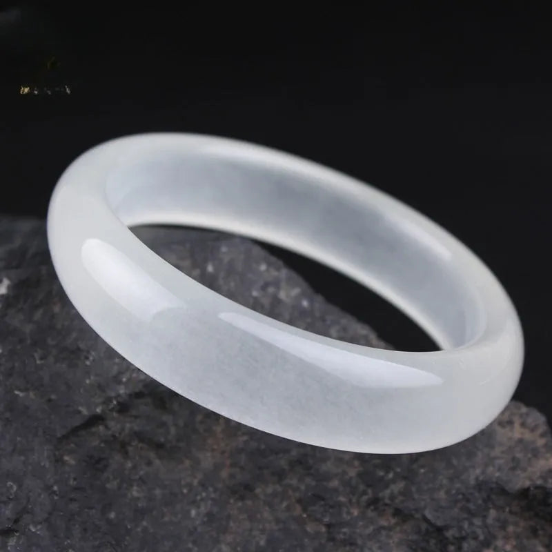 Gao Bing ice-like white moonlight jade bracelet showing flat rod and round rod style options on a wrist.
