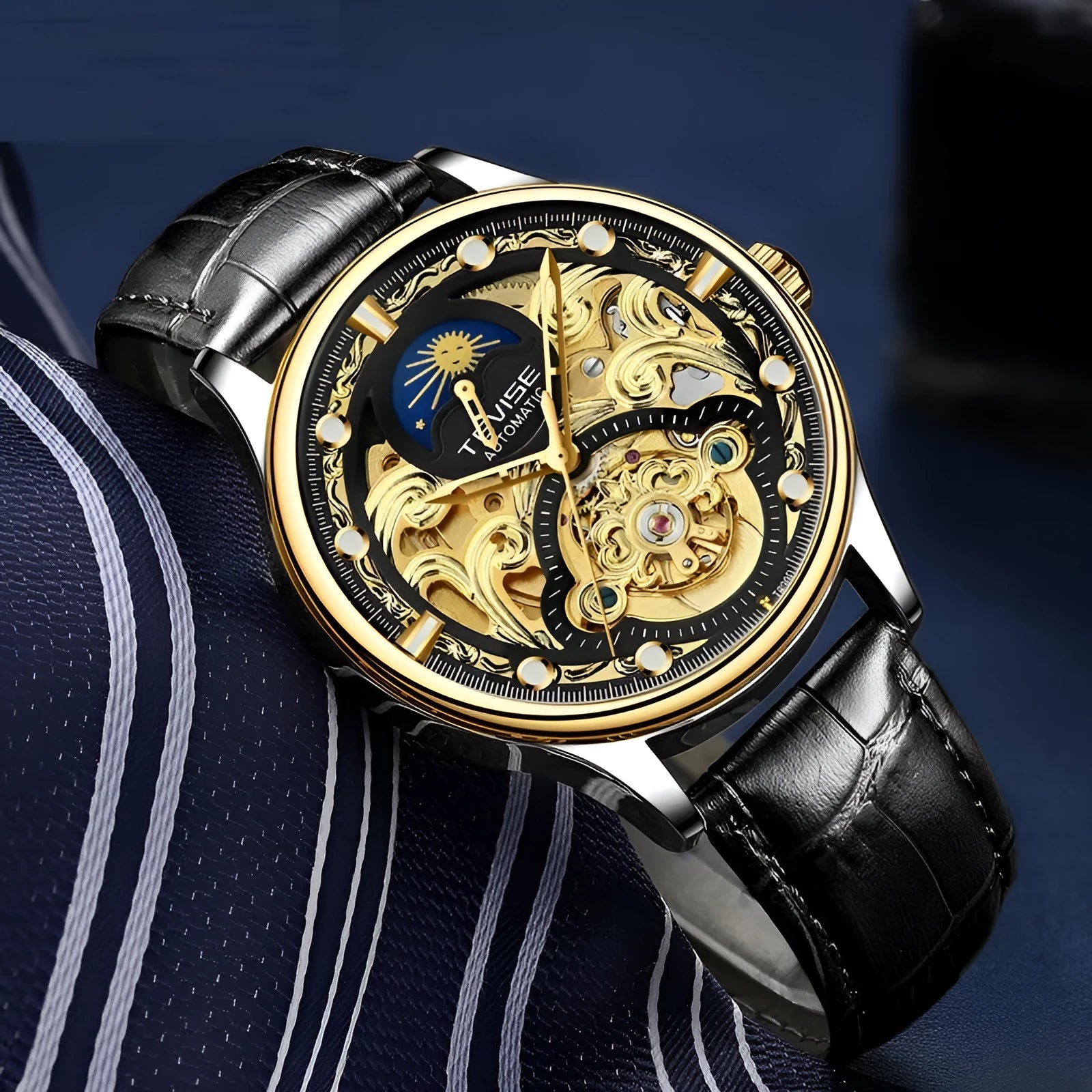 Gold leather strap men's automatic mechanical watch on wrist showing business style.