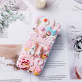 Pink and green cartoon rabbit design silicone iPhone case showing 3D texture
