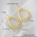 Women's yellow gold geometric drop earrings with 2.6cm length and round ring design elements
